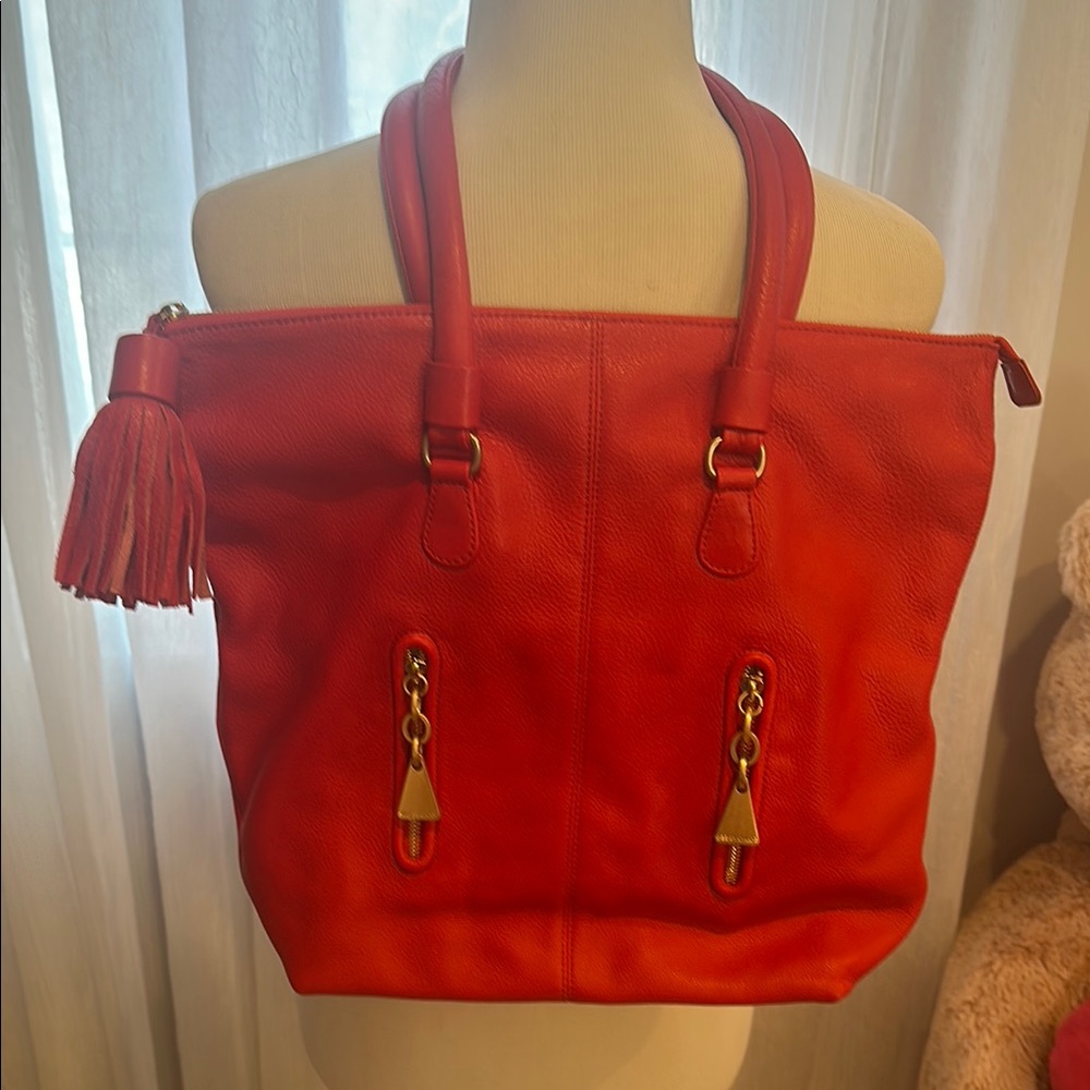 Like new see By Chloe beautiful Red Tote Bag with Decorative Tassel
